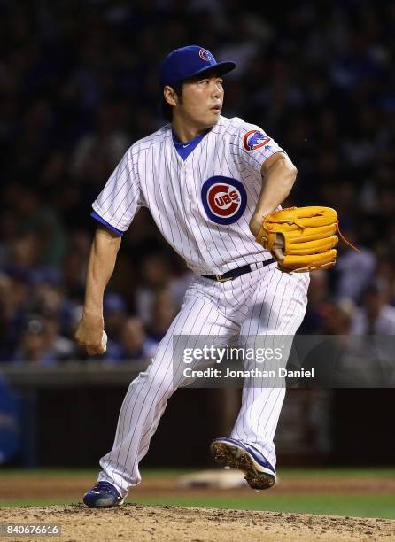 Koji Uehara of the Chicago Cubs pitches in the 7th inning against the Pittsburgh Pirates at Wrigley Field on August 29, 2017 in Chicago, Illinois.