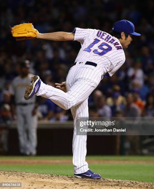 Koji Uehara of the Chicago Cubs pitches in the 7th inning against the Pittsburgh Pirates at Wrigley Field on August 29, 2017 in Chicago, Illinois.