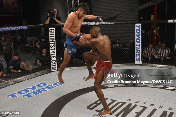 Elias Urbina lands a flying knee to the face of Bevon Lewis in their middleweight bout during Dana White's Tuesday Night Contender Series at the TUF...