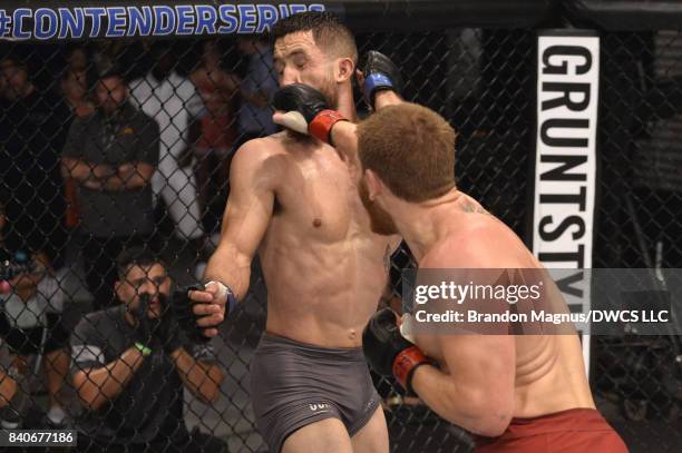 Matt Frevola punches Luke Flores in their lightweight bout during Dana White's Tuesday Night Contender Series at the TUF Gym on August 29, 2017 in...