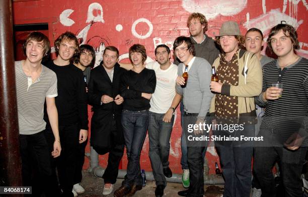 Andy Nicholson ex member of Arctic Monkeys with Alex Turner and Matt Helders of Arctic Monkeys along with The Rascals and friends backstage at Night...