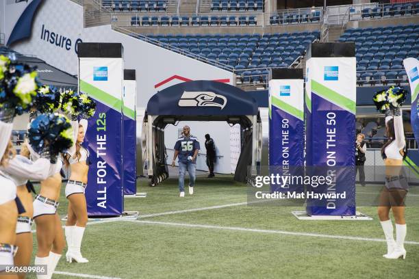 Seattle Seahawks star Cliff Avril greets hundreds of fans and Seattle business owners during American Express "Dinner on the 50" at CenturyLink Field...