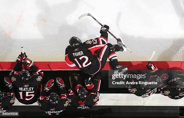 Mike Fisher of the Ottawa Senators hops over the boards for his shift against the Florida Panthers at Scotiabank Place on December 8, 2008 in Ottawa,...