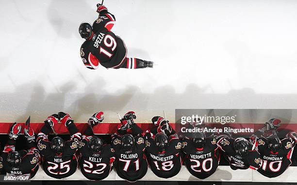 Jason Spezza of the Ottawa Senators skates by the players' bench in an NHL game against the Florida Panthers at Scotiabank Place on December 8, 2008...