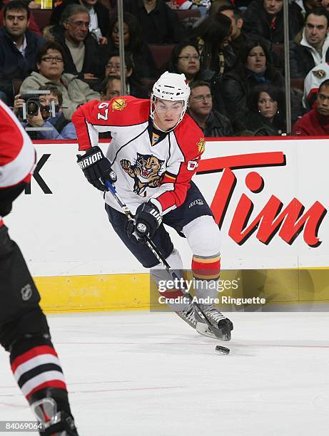 Michael Frolik of the Florida Panthers stickhandles the puck against the Ottawa Senators at Scotiabank Place on December 8, 2008 in Ottawa, Ontario,...