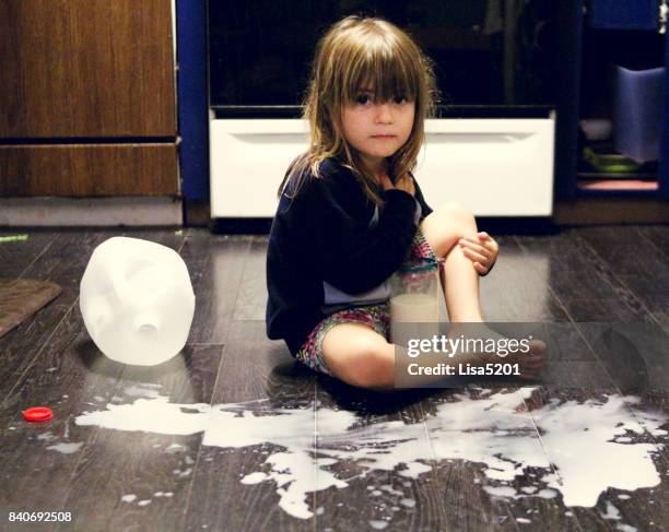 spilled milk - careless stock pictures, royalty-free photos & images