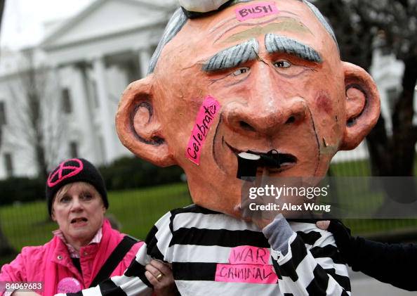 Code Pink Owner A member of Code Pink dressed as President George W. Bush gestures as ...