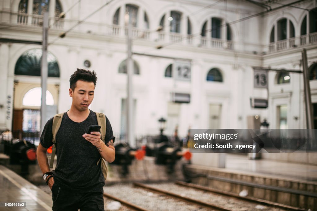 Texting by the railroad track