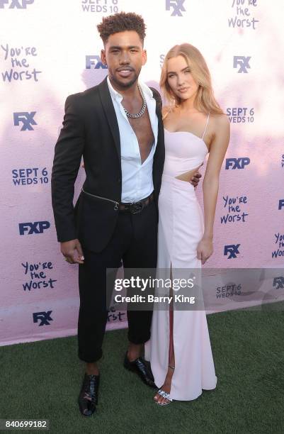 Actors Brandon Mychal Smith and guest attend the premiere of FXX's 'You're The Worst' Season 4 at Museum of Ice Cream LA on August 29, 2017 in Los...