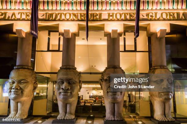 Faces at Dotombori Hotel -The Dotombori Hotel in Osaka welcomes guests with an amazing entrance featuring four huge columns with faces depicting the...