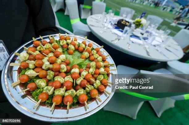 Appetizers are served during the American Express "Dinner on the 50" at CenturyLink Field on August 29, 2017 in Seattle, Washington.