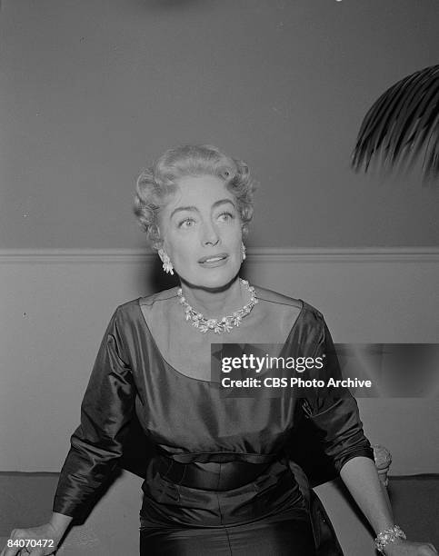 Joan Crawford plays the part of Ann Howard in the General Electric Theater television program 'And One Was Loyal', 1958.