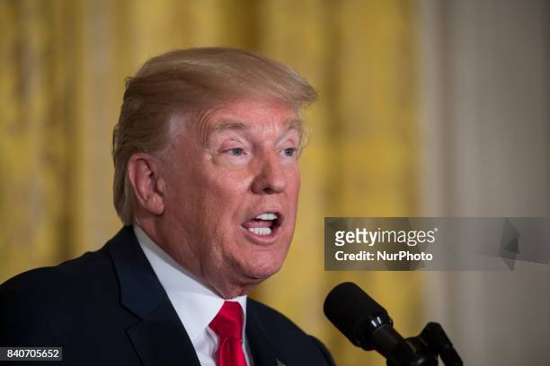 President Donald Trump speaks during his joint press conference with President Sauli Niinistö of the Republic of Finland, in the East Room of the...