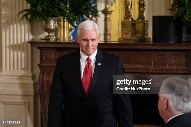 Mike Pence, was present for the joint press conference of President Donald Trump and President Sauli Niinistö of the Republic of Finland, in the East...