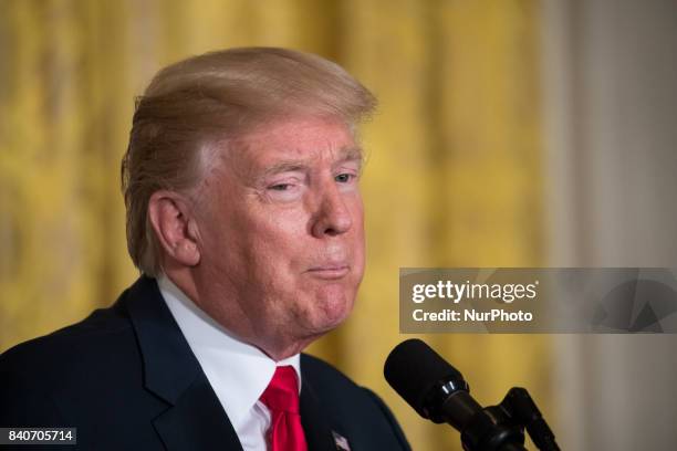 President Donald Trump speaks during his joint press conference with President Sauli Niinistö of the Republic of Finland, in the East Room of the...