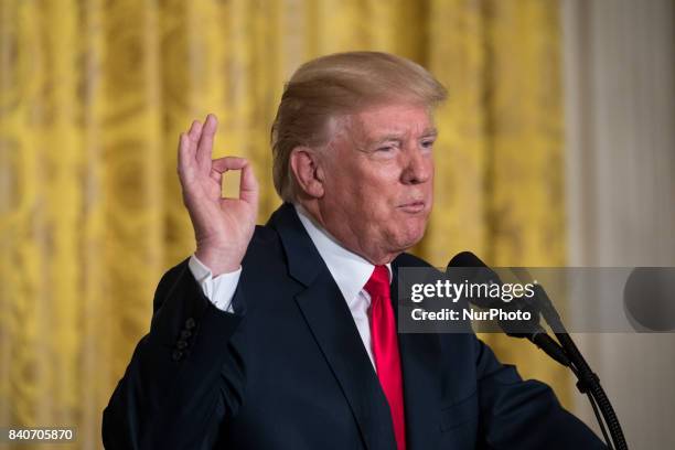 President Donald Trump speaks during his joint press conference with President Sauli Niinistö of the Republic of Finland, in the East Room of the...