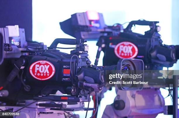 General view of Fox Footy television cameras as Tigers coach Damien Hardwick and captain Trent Cotchin speak to the media during a Richmond Tigers...