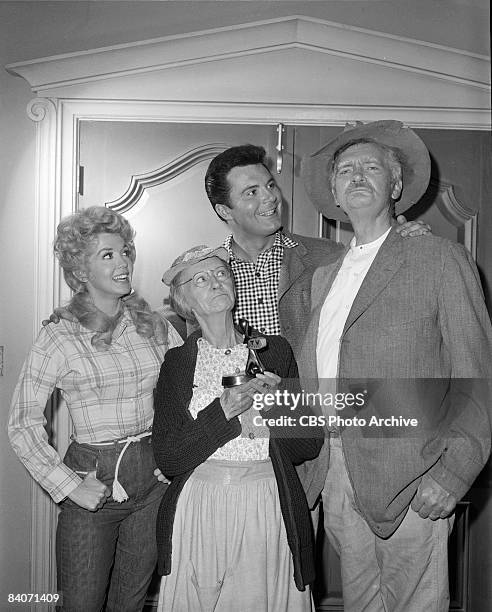 Group portrait of The Beverly Hillbillies, from left: Donna Douglas as Elly May Clampett, Irene Ryan as Daisy Moses, 'Granny' , Max Baer, Jr. As...