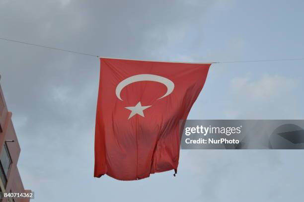 Huge Turkish flag can be seen posted between two residential buildings in Ankara, Turkey on August 29, 2017 as Turkish citizens prepare to celebrate...