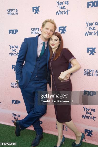 Actors Chris Geere and Aya Cash attend the premiere of FXX's "You're The Worst" Season 4 at Museum of Ice Cream LA on August 29, 2017 in Los Angeles,...