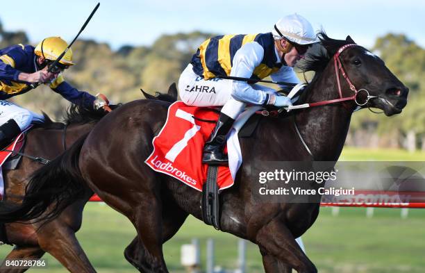 Mark Zahra riding Night's Watch wins Race 8 during Melbourne Racing at Sandown Hillside on August 30, 2017 in Melbourne, Australia.