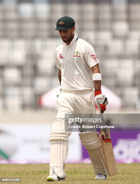 Glenn Maxwell of Australia walks off the ground after he was dismissed by Shakib Al Hasan of Bangladesh during day four of the First Test match...