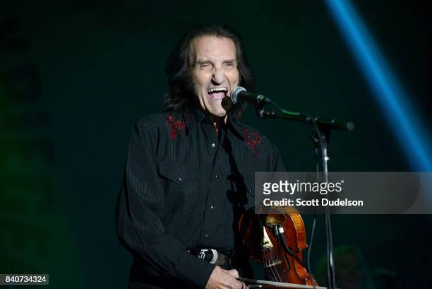 Musician Doug Kershaw performs onstage during the 10th annual Medlock Krieger All Star Concert benefiting St Judes Children's Research Hospital at...