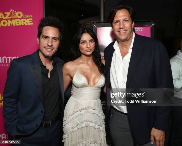 Mauricio Ochmann, Aislinn Derbez and Pantelion CEO Paul Presburger attend the "Hazlo Como Hombre" Los Angeles Premiere at ArcLight Hollywood on...