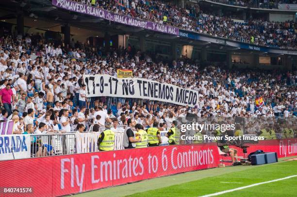 Soccer fans hold a "17-8-17 No Tenemos Miedo" banner in response to the Barcelona terror attack on 17 August prior to the Santiago Bernabeu Trophy...