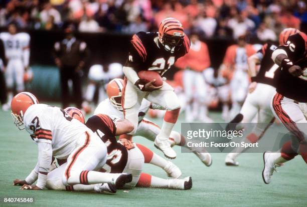 James Brooks of the Cincinnati Bengals carries the ball against the Cleveland Browns during an NFL football game circa 1988 at Riverfront Stadium in...