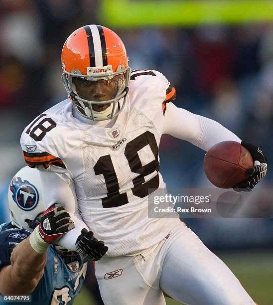 Donte Stallworth of the Cleveland Browns carries for a first down against the Tennessee Titans on December 7, 2008 at LP Field in Nashville,...