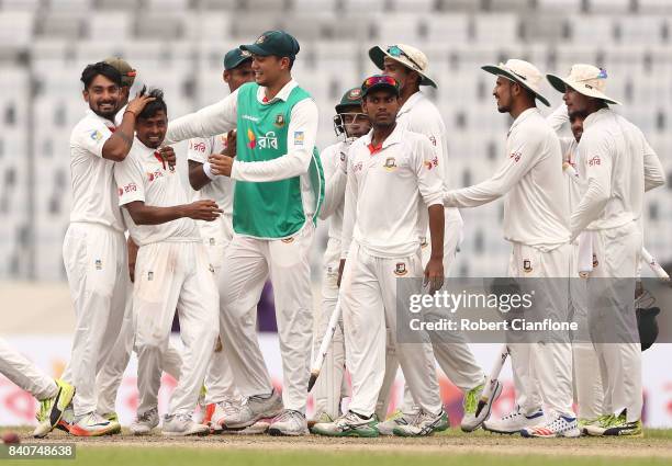 Bangladesh celebrate after they defeated Australia during day four of the First Test match between Bangladesh and Australia at Shere Bangla National...