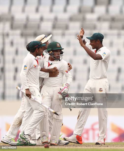 Bangladesh celebrate after they defeated Australia during day four of the First Test match between Bangladesh and Australia at Shere Bangla National...