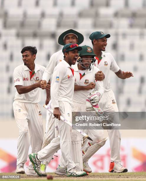 Bangladesh celebrate after they defeated Australia during day four of the First Test match between Bangladesh and Australia at Shere Bangla National...