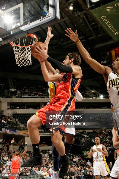 Marco Belinelli of the Golden State Warriors drives to the basket against the Indiana Pacers at Conseco Fieldhouse on December 18, 2008 in...