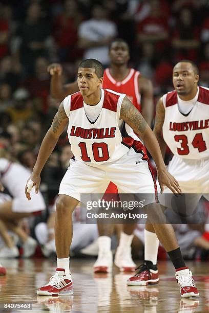 Edgar Sosa of the Louisville Cardinals guards on the court against the Austin Peay Governors at Freedom Hall on December 13, 2008 in Louisville,...