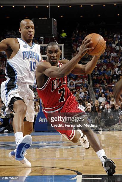 Ben Gordon of the Chicago Bulls drives to the basket against Keith Bogans of the Orlando Magic during the game at Amway Arena on November 3, 2008 in...