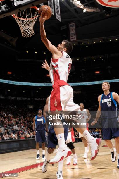 Jose Calderon of the Toronto Raptors drives to the hoop during a game against the Dallas Mavericks at the Air Canada Centre December 17, 2008 in...