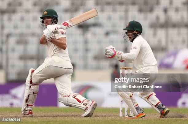 Pat Cummins of Australia bats during day four of the First Test match between Bangladesh and Australia at Shere Bangla National Stadium on August 30,...