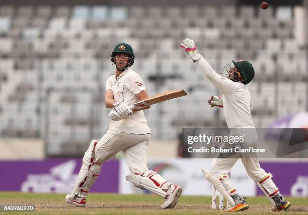 Pat Cummins of Australia bats during day four of the First Test match between Bangladesh and Australia at Shere Bangla National Stadium on August 30,...