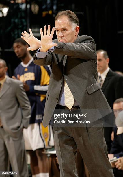Jim O'Brien, head coach of the Indiana Pacers, directs his team to a victory over the Golden State Warriors 127-120 at Conseco Fieldhouse on December...
