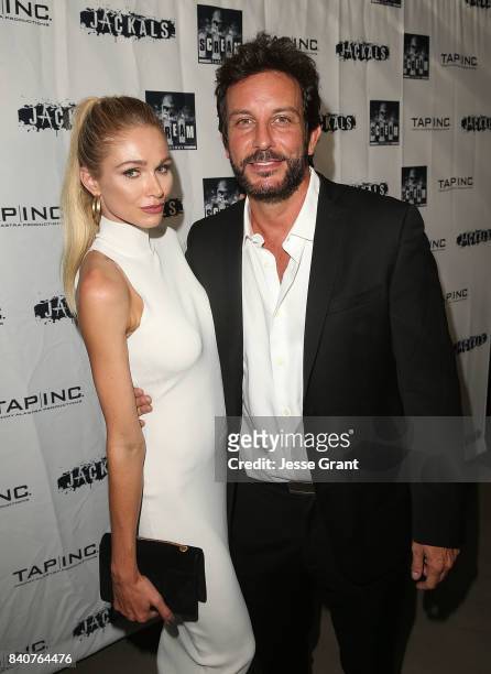 Actress Alyssa Julya Smith and producer Tommy Alastra attend the Los Angeles Premiere of "Jackals" on August 29, 2017 in Hollywood, California.