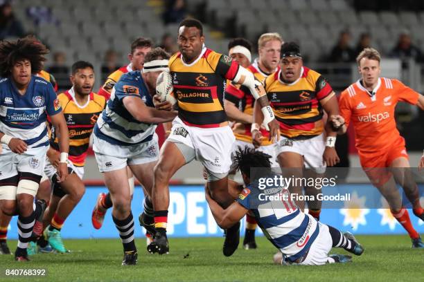 Illisea Ratuva Tavuyara of Waikato takes on the Auckland defence during the round three Mitre 10 Cup match between Auckland and Waikato at Eden Park...