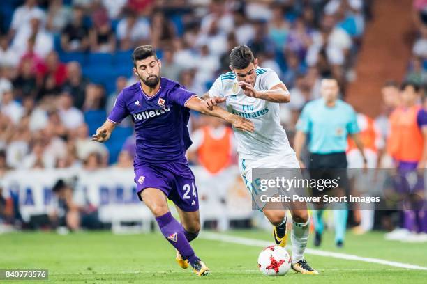 Theo Hernandez of Real Madrid fights for the ball with Marco Benassi of ACF Fiorentina during the Santiago Bernabeu Trophy 2017 match between Real...