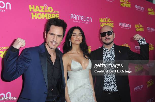 Actor Mauricio Ochmann, actress Aislinn Derbez and director Nicolas Lopez arrive for the Premiere Of Pantelion Films' "Hazlo Como Hombre" held at...