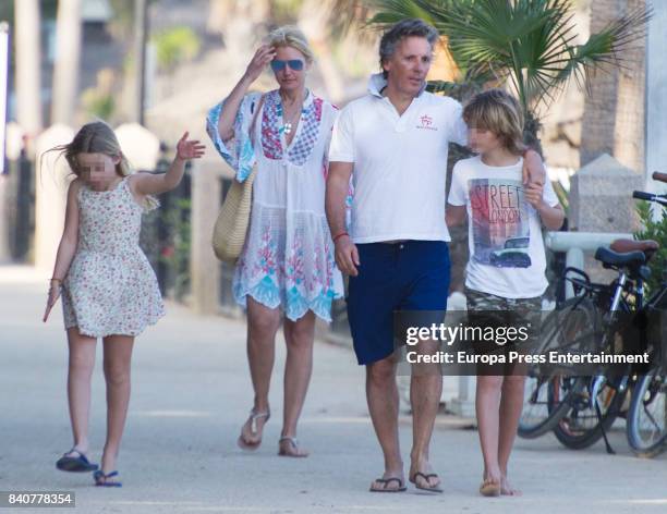 Part of this image has been pixellated to obscure the identity of the child). Model Valeria Mazza, her husband Alejandro Gravier, their son Benicio...