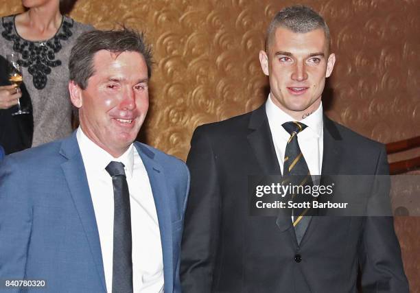 Dustin Martin of the Tigers and Giants football manager Wayne Campbell talk during the AFL All Australian team announcement at the Palais Theatre on...