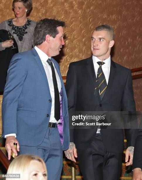 Dustin Martin of the Tigers and Giants football manager Wayne Campbell talk during the AFL All Australian team announcement at the Palais Theatre on...