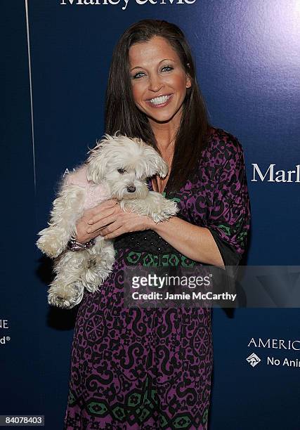 Wendy Diamond and her dog Lucky attends the premiere of "Marley & Me" at the Tribeca Cinemas Gallery on December 17, 2008 in New York City.