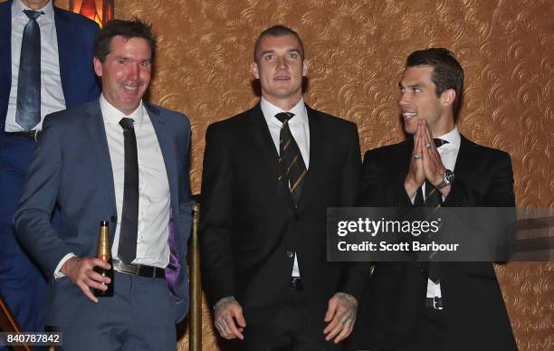 Giants football manager Wayne Campbell, Dustin Martin of the Tigers and Alex Rance of the Tigers talk during the AFL All Australian team announcement...